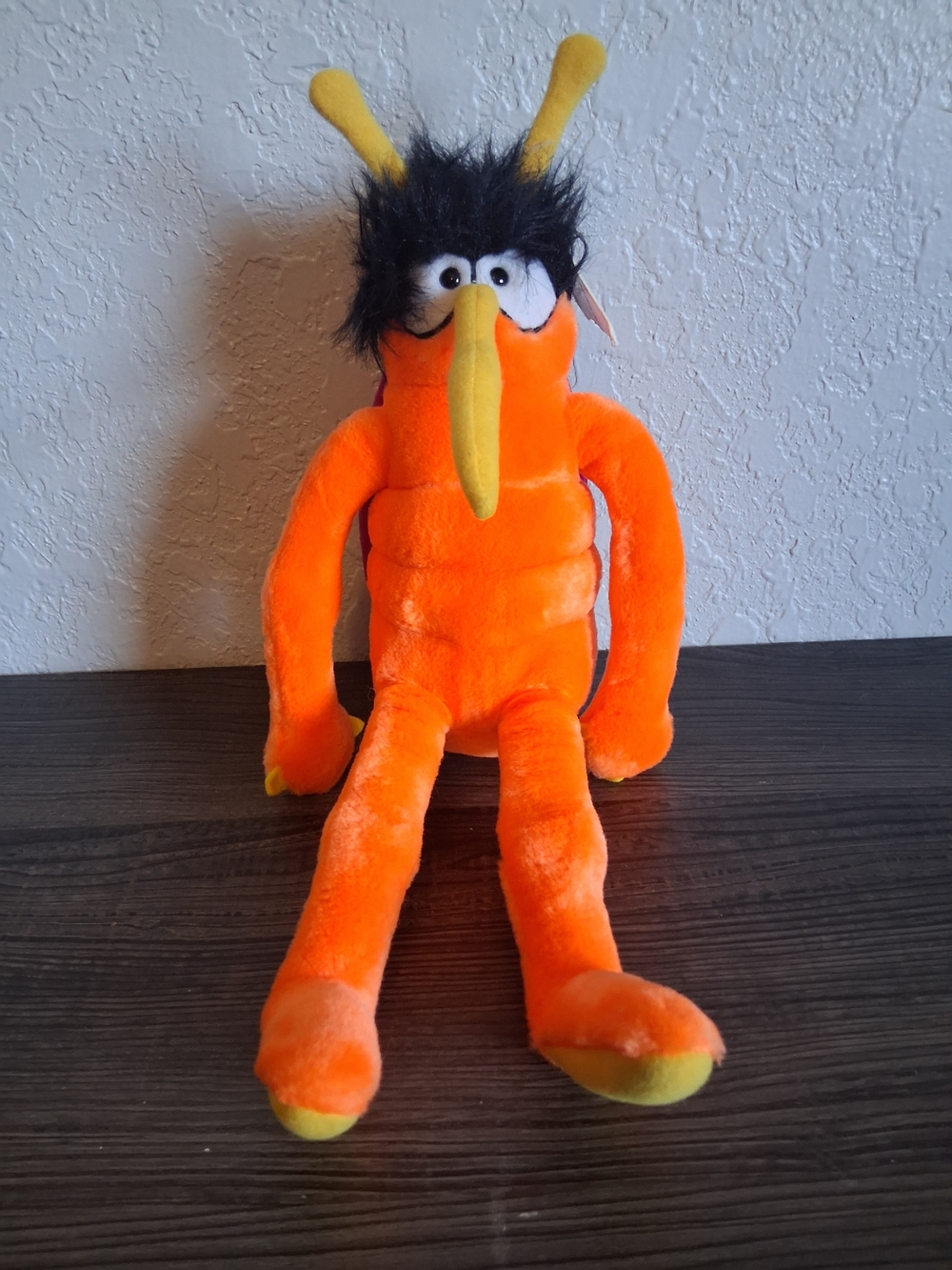 Dakine Bright Orange Plush Creature Toy with Yellow Accents